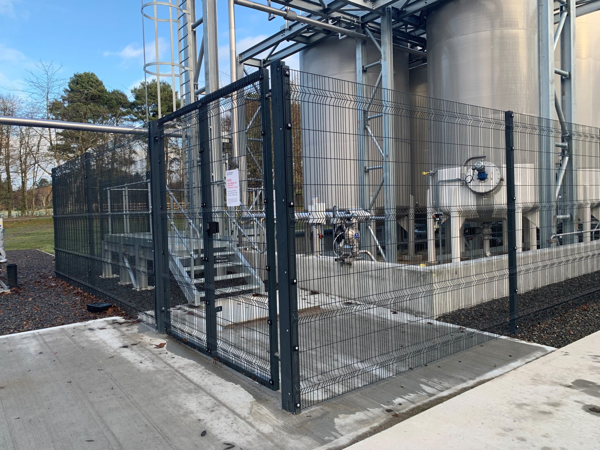 2400mm high 'Paladin' fence in Anthracite Grey (RAL 7016).