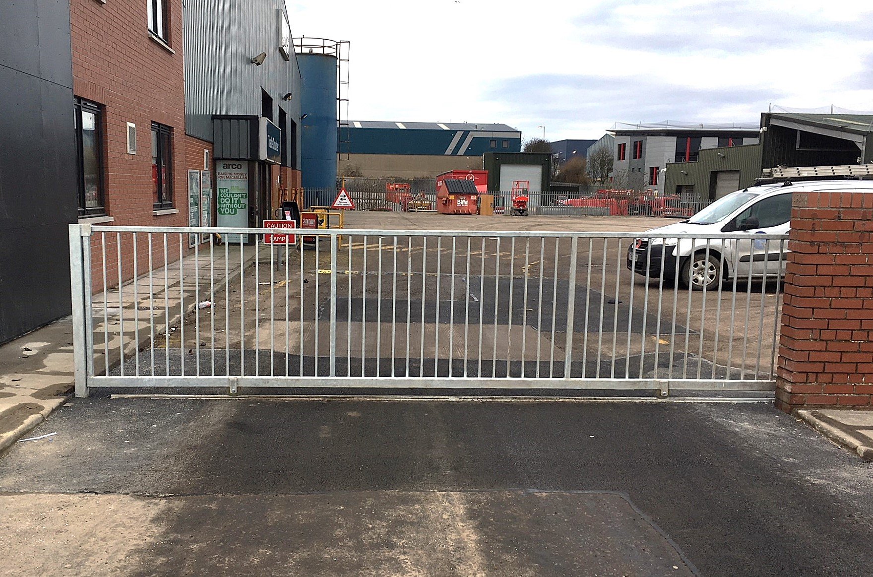 A low level sliding gate installed to prevent unauthorised parking.