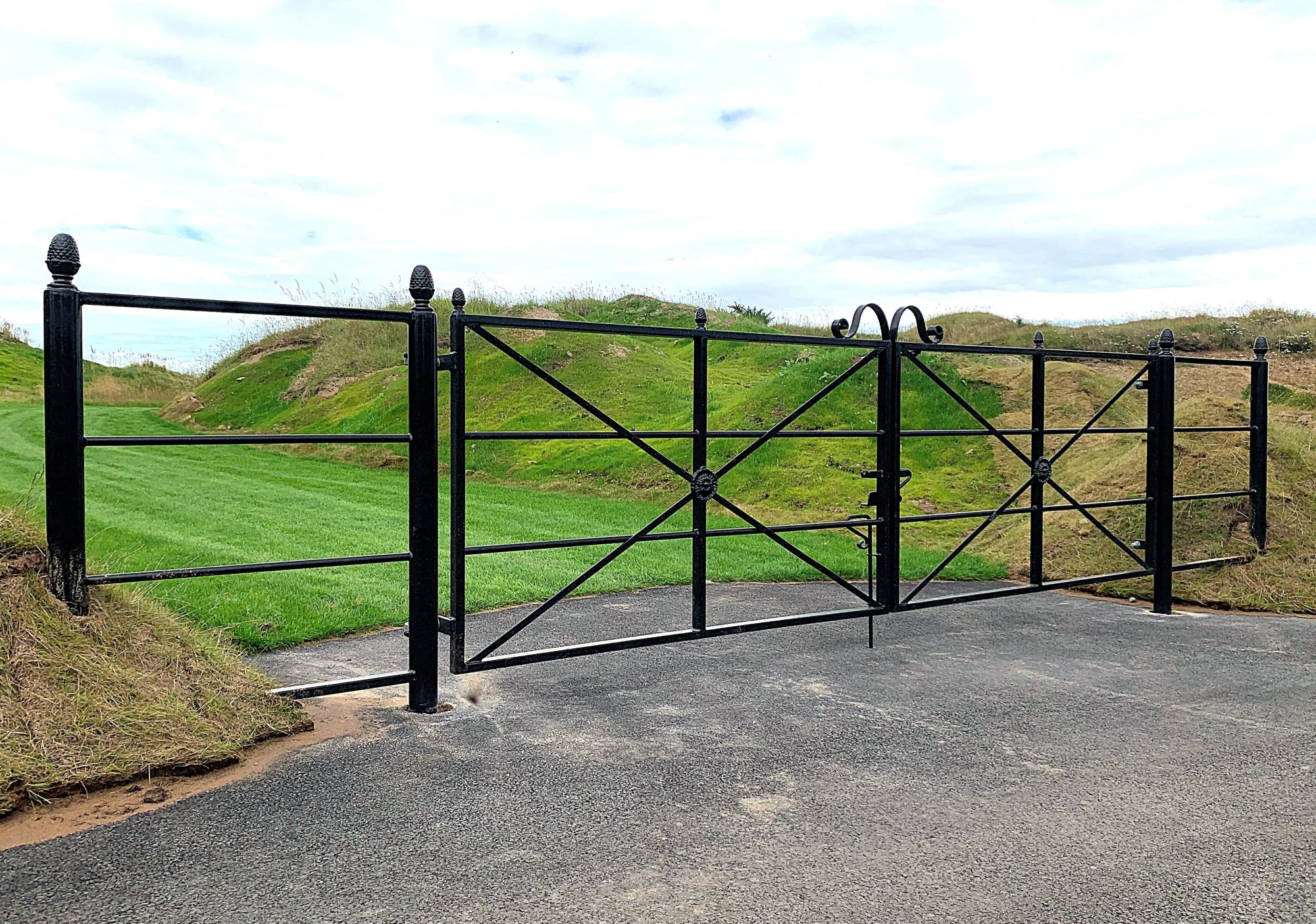 Decorative Estate style gates installed on a golf course. Given the coastal environment, these gates were galvanised and Marine Grade PPC coated following fabrication.