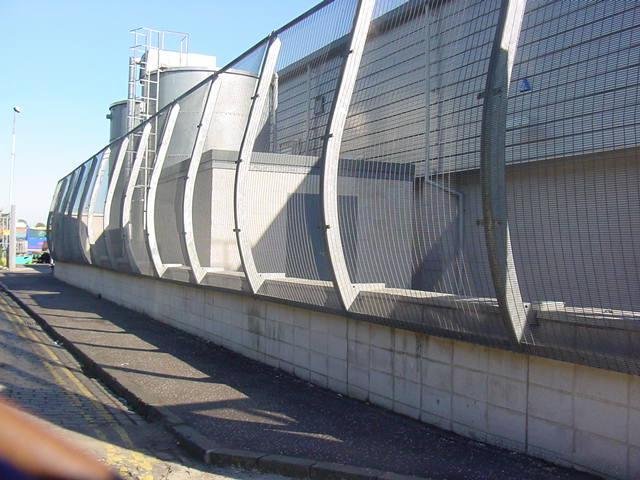 Bespoke 358 welded mesh security fence on curved RHS posts. The posts were produced in-house by our fabrication workshop.